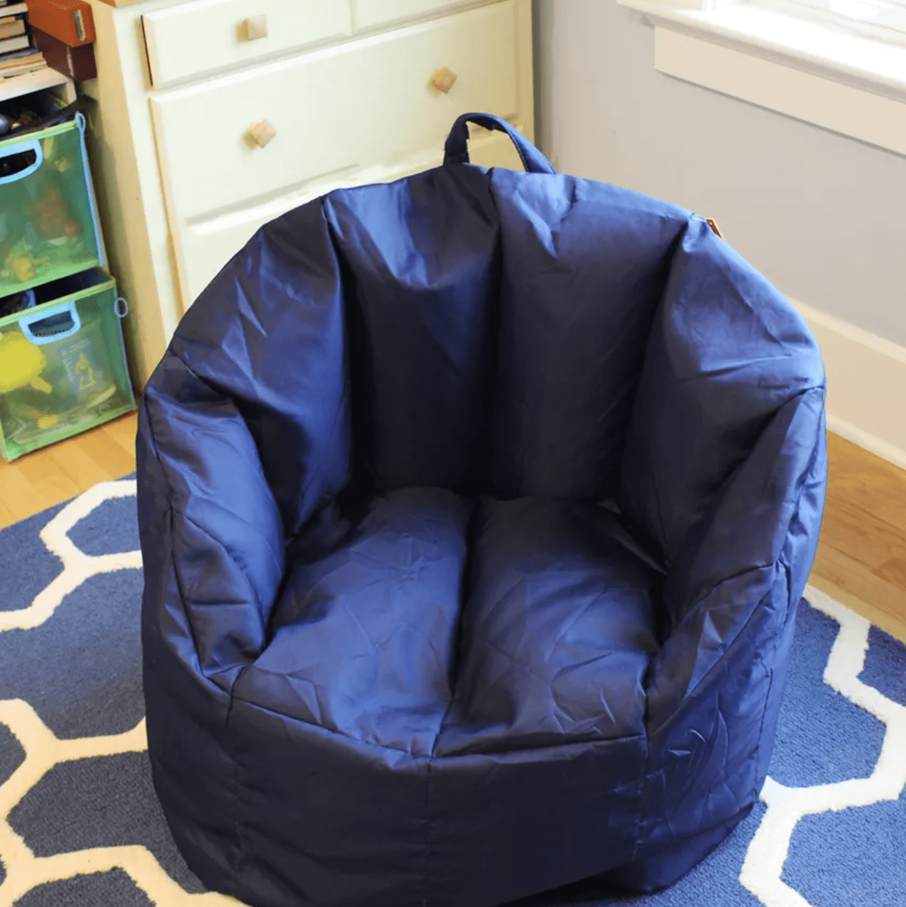 Big Joe Milano Bean Bag Chair displayed in corner of room on carpet