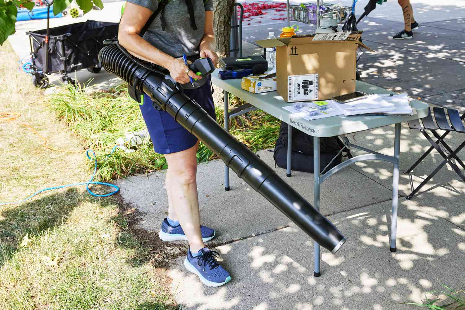 Person holding the hose of a EGO Power+ LB6003 600 CFM Variable-Speed 56-Volt Cordless Leaf Blower